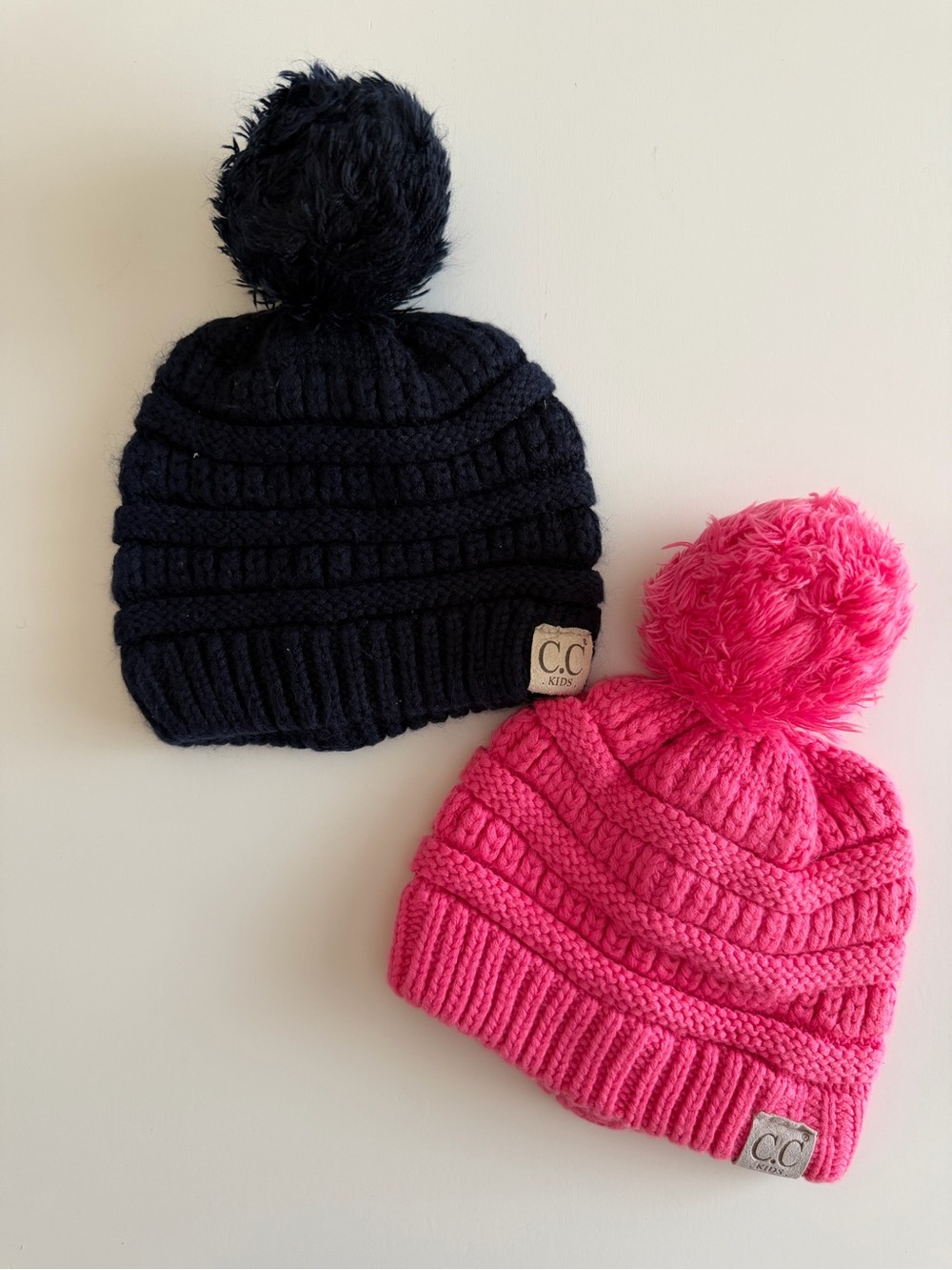 C.C Baby/Toddler Pom Beanies in Black and Hot Pink